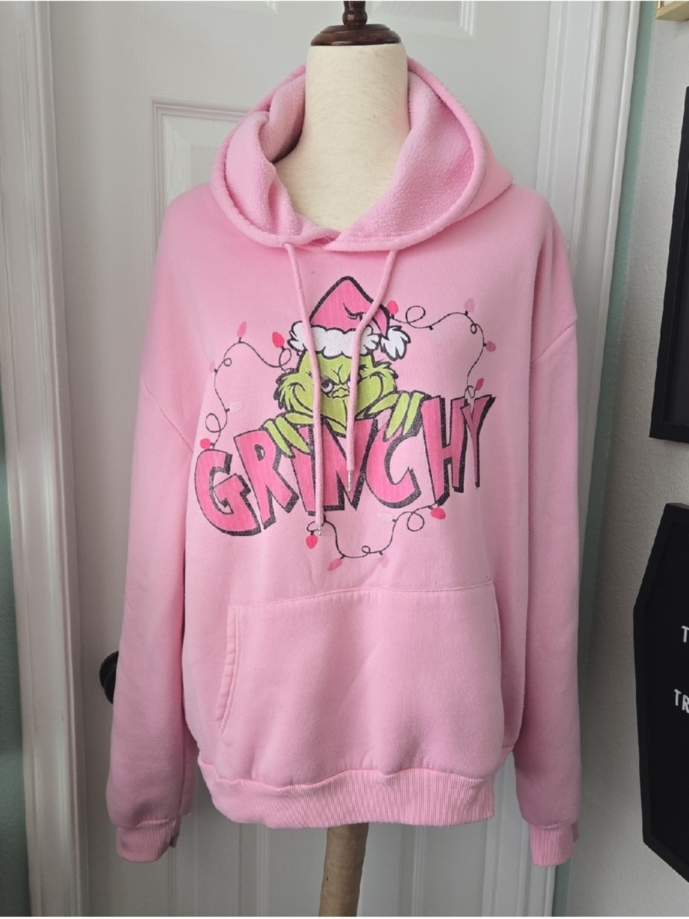 The Grinch XL pink Hooded Pullover Sweatshirt with grinch images front and back